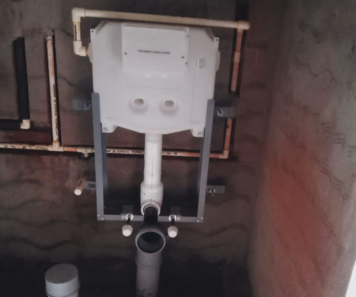 It's a type of toilet tank that is installed inside the wall