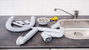 Sink with pipes on it