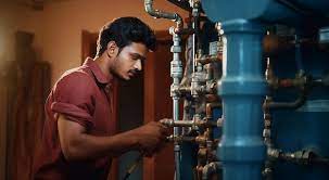 A man repairing the pipe