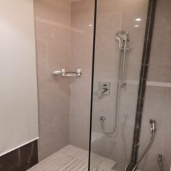 This is a glass shower enclosure. 